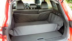 En praktisk detalje til bagagerummet, hvis man har aktiv fritid, eller det kan være ungernes beskidte gummistøvler.